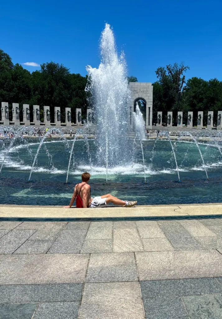 Rowan Frew by the fountain at the World War II Memorial