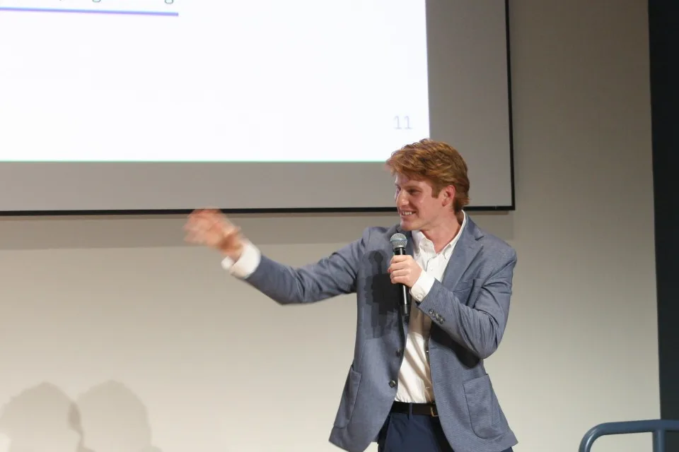 Rowan Frew presenting ZoneIQ on stage